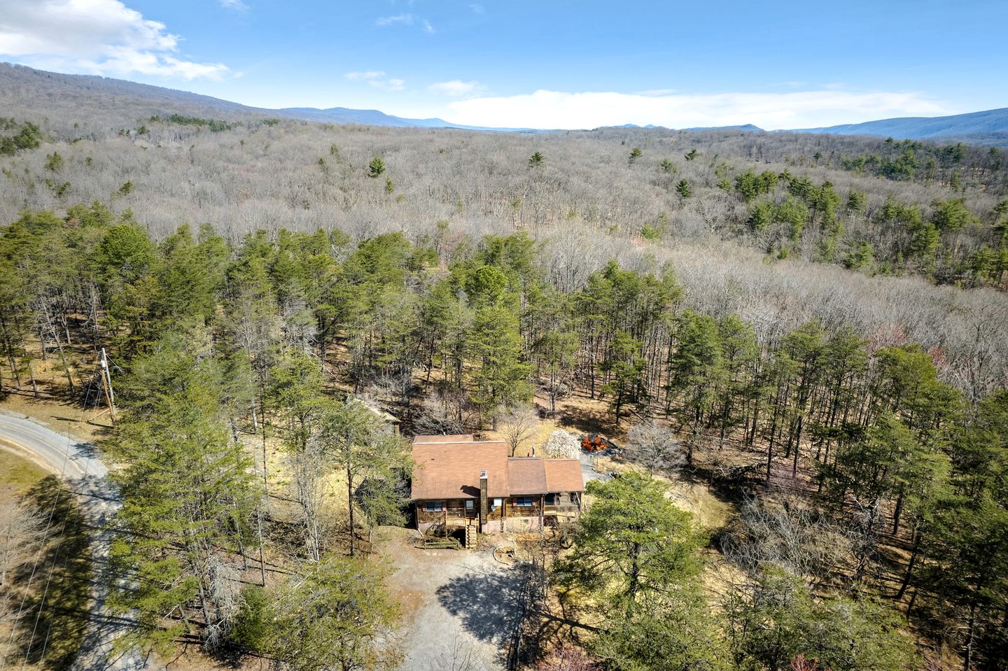 Extraordinary Group Retreat with Hot Tub, Fire Pit, Wraparound Deck in Great Cacapon, WV