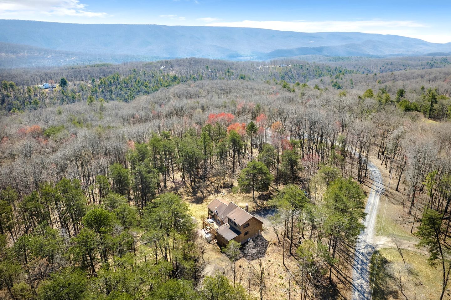 Extraordinary Group Retreat with Hot Tub, Fire Pit, Wraparound Deck in Great Cacapon, WV