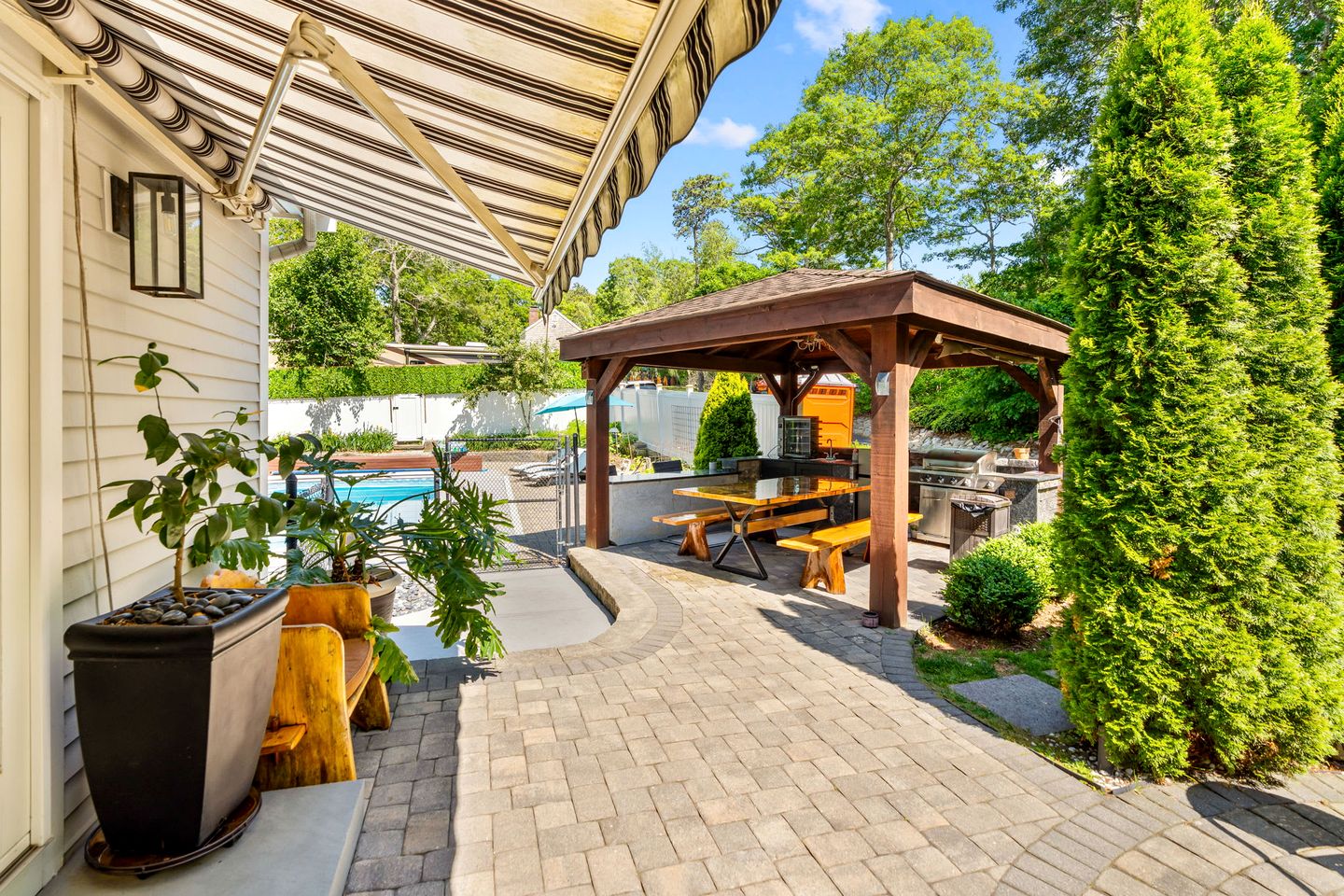 Elegant Coastal Retreat with Heated Pool, Firepit & Game Room Near Cape Cod Beaches | Barnstable, Massachusetts
