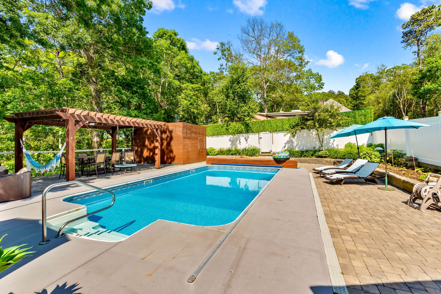 Elegant Coastal Retreat with Heated Pool, Firepit & Game Room Near Cape Cod Beaches | Barnstable, Massachusetts