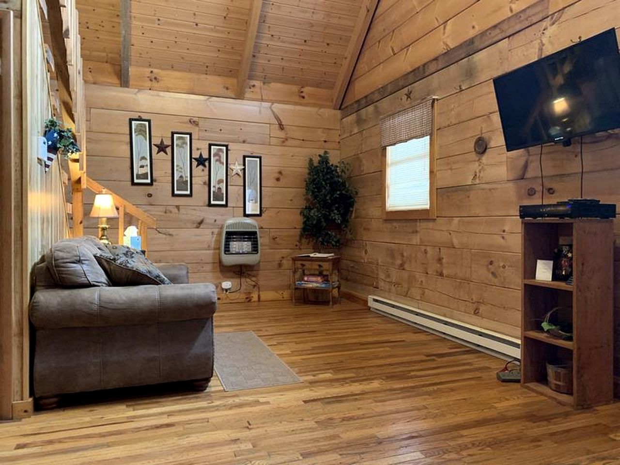 Rustic Wooden Cabin Settled Between Trees in Monterville, West Virginia
