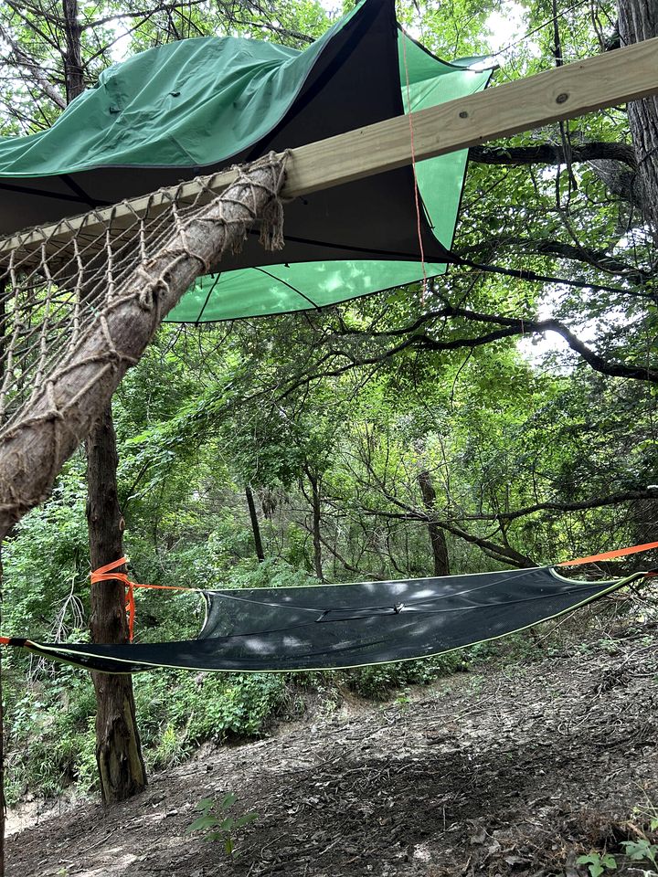 Unique Jungle-Style Glamping RV with 8-Foot Suspended Tree Tent near Creek Trails in Forestburg, Texas