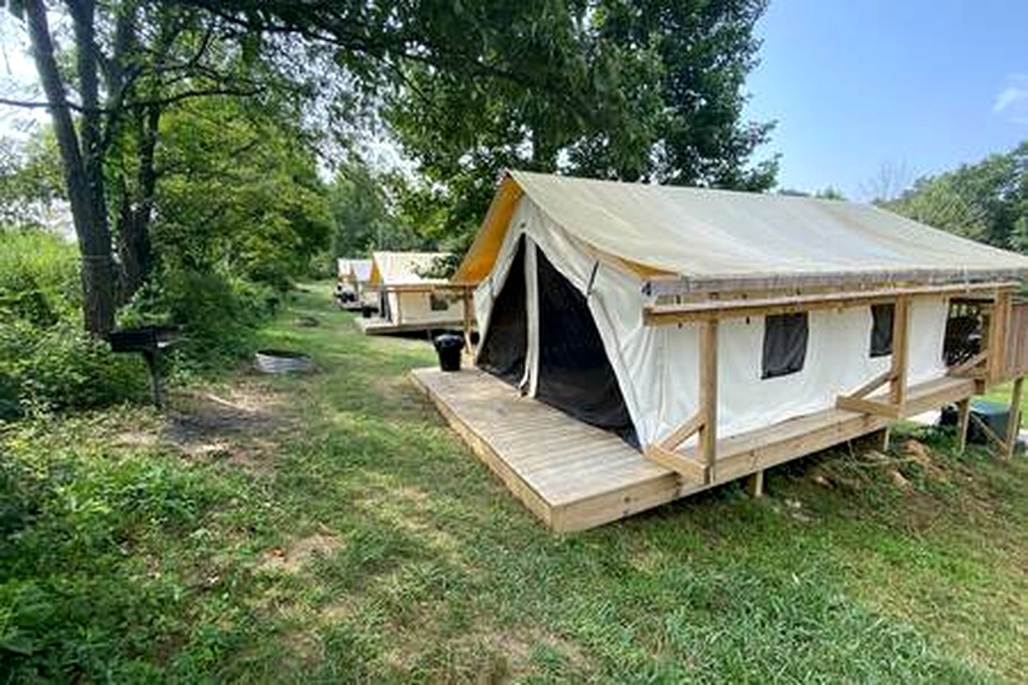 Sensational Tented Cabin Nestled Amidst Trees and Fire Pit Provided in Logan, Ohio