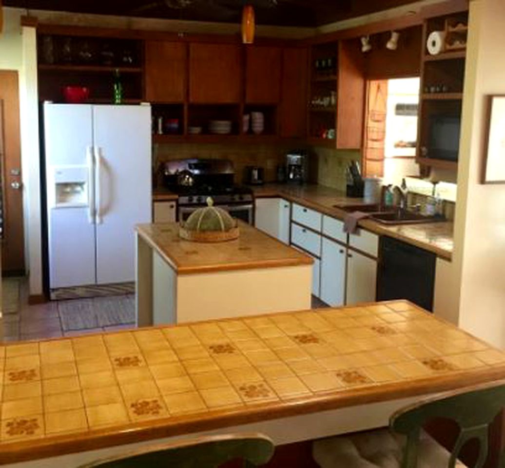 Charming Vacation Rental Surrounded by Palm Trees Just Steps from the Beach on Island of Maui, Hawaii
