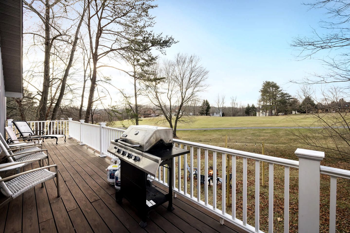 Charming Cabin with Multiple Fire Pits, Screened Porch, and Golf Course Views in Hedgesville, West Virginia