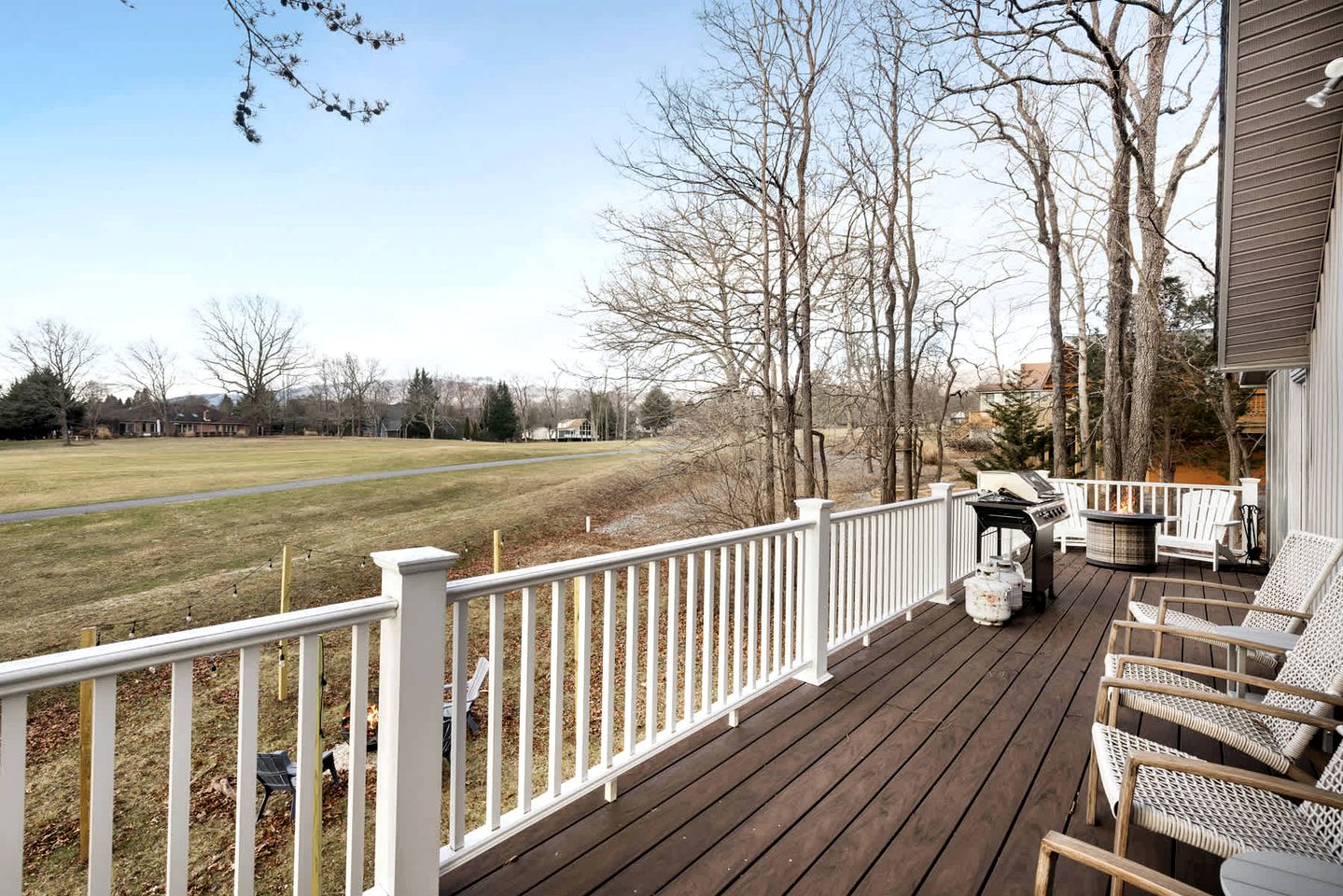 Charming Cabin with Multiple Fire Pits, Screened Porch, and Golf Course Views in Hedgesville, West Virginia