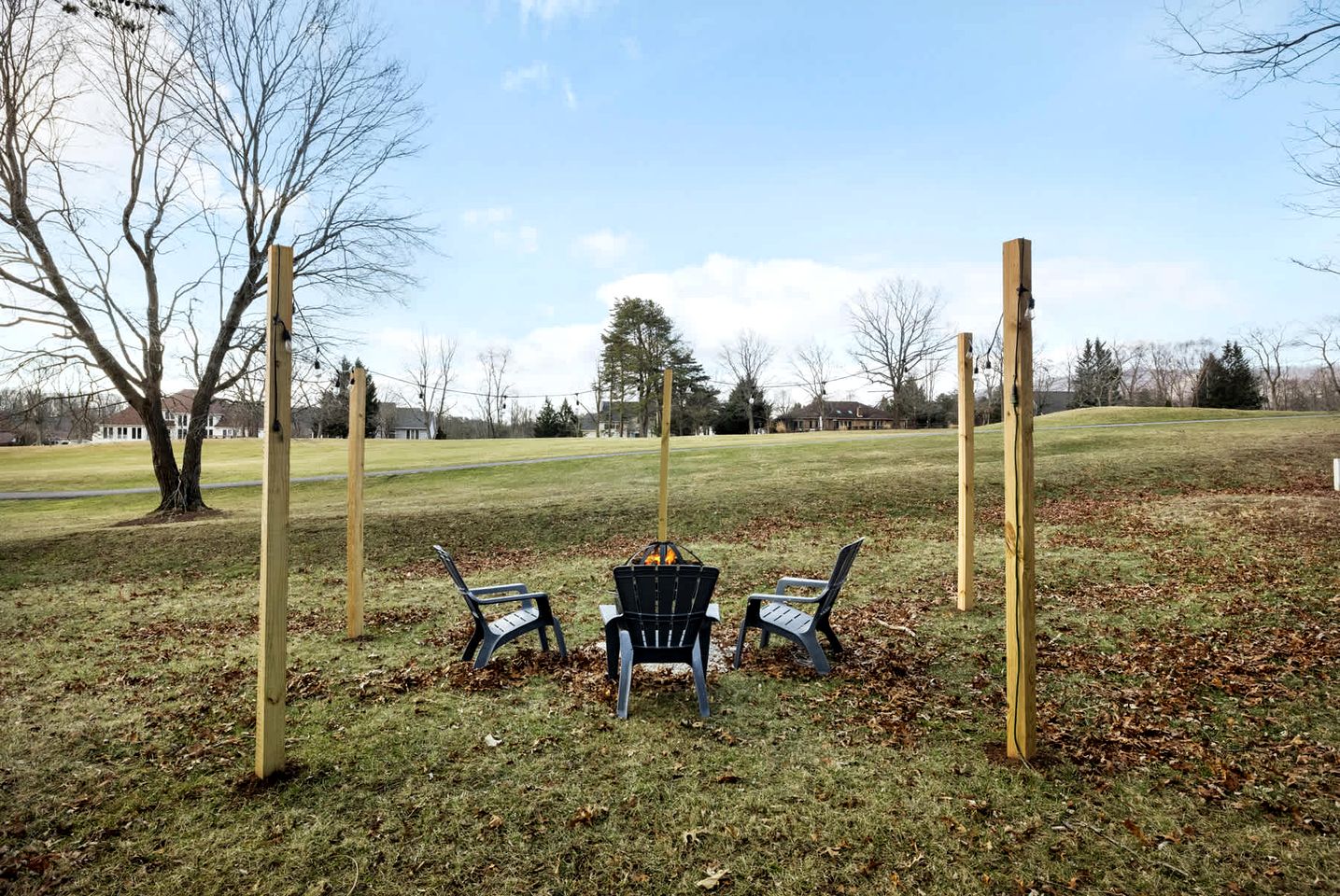 Charming Cabin with Multiple Fire Pits, Screened Porch, and Golf Course Views in Hedgesville, West Virginia