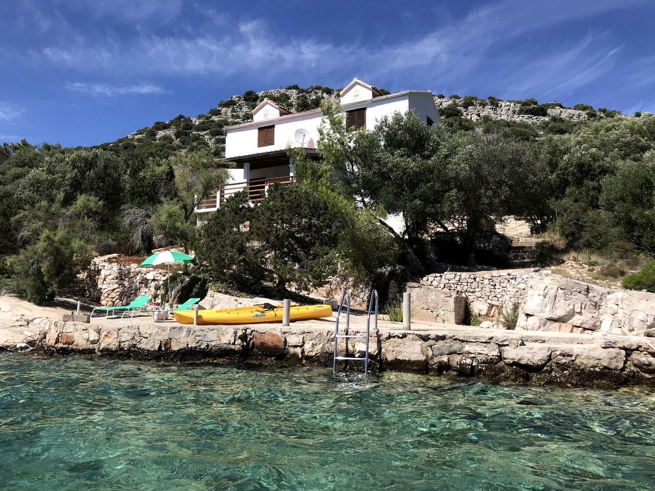 Gorgeous Waterfront Villa Rental with a Private Boat Dock in Skrivena Luka, Croatia