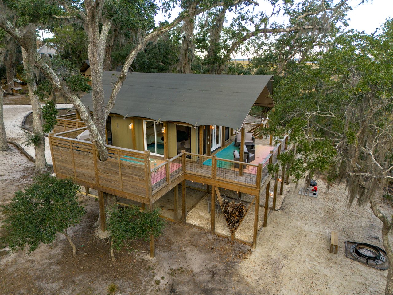 Secluded Treehouse Tent Retreat on the Marsh with Outdoor Dining, Grilling Gear, Games, Views in Townsend, Georgia