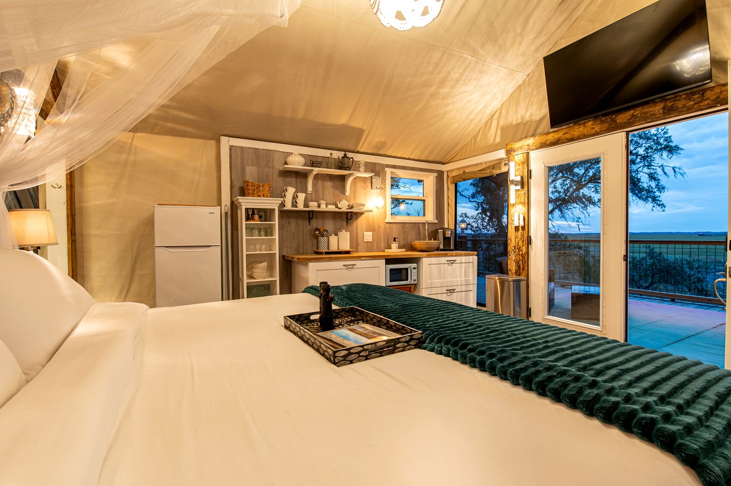 Secluded Treehouse Tent Retreat on the Marsh with Outdoor Dining, Grilling Gear, Games, Views in Townsend, Georgia