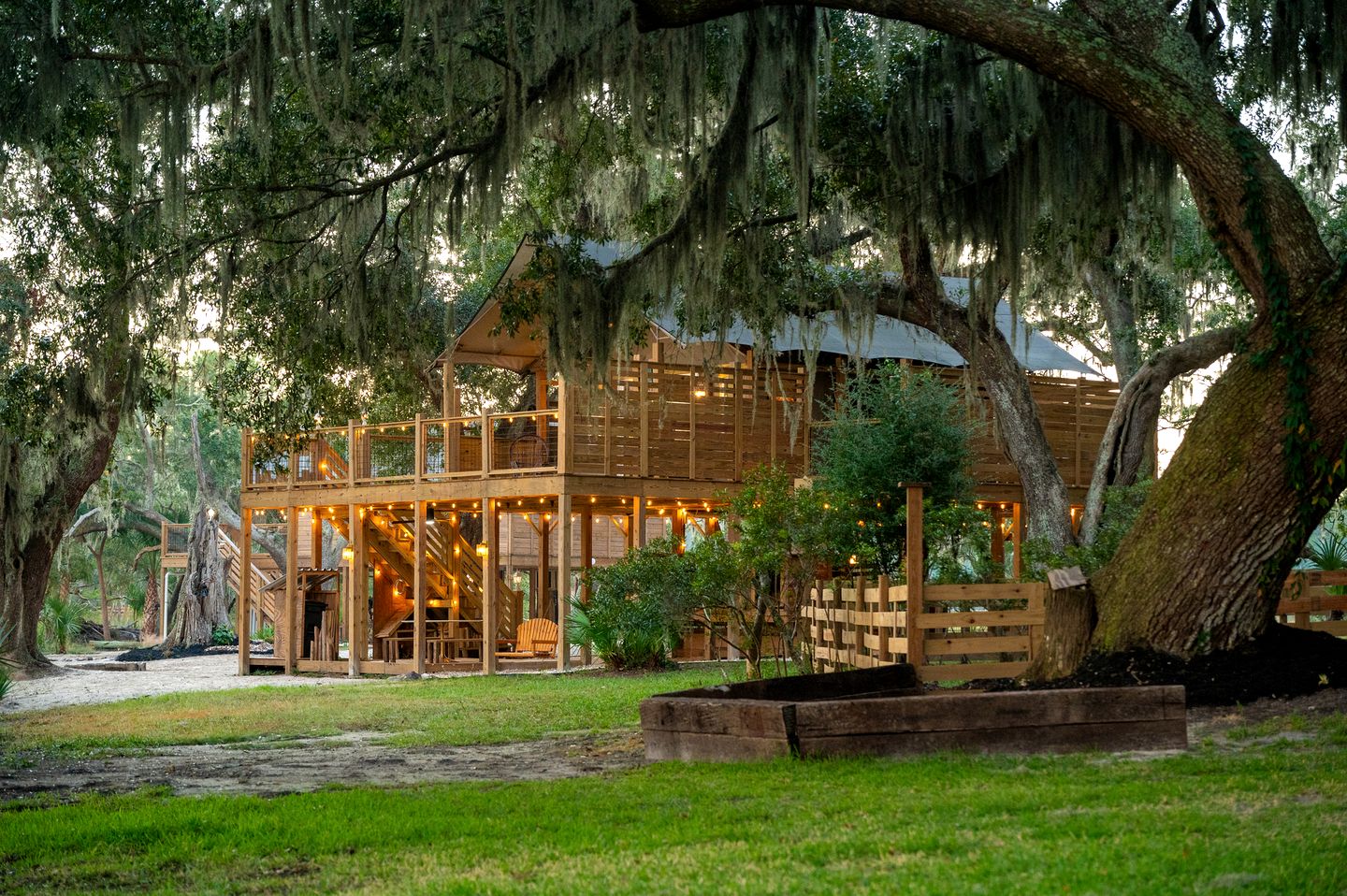 Marsh-View Treehouse Tent Glamping with Private Campsite, Wildlife Watching, BBQ, Fire Pit in Townsend, Georgia