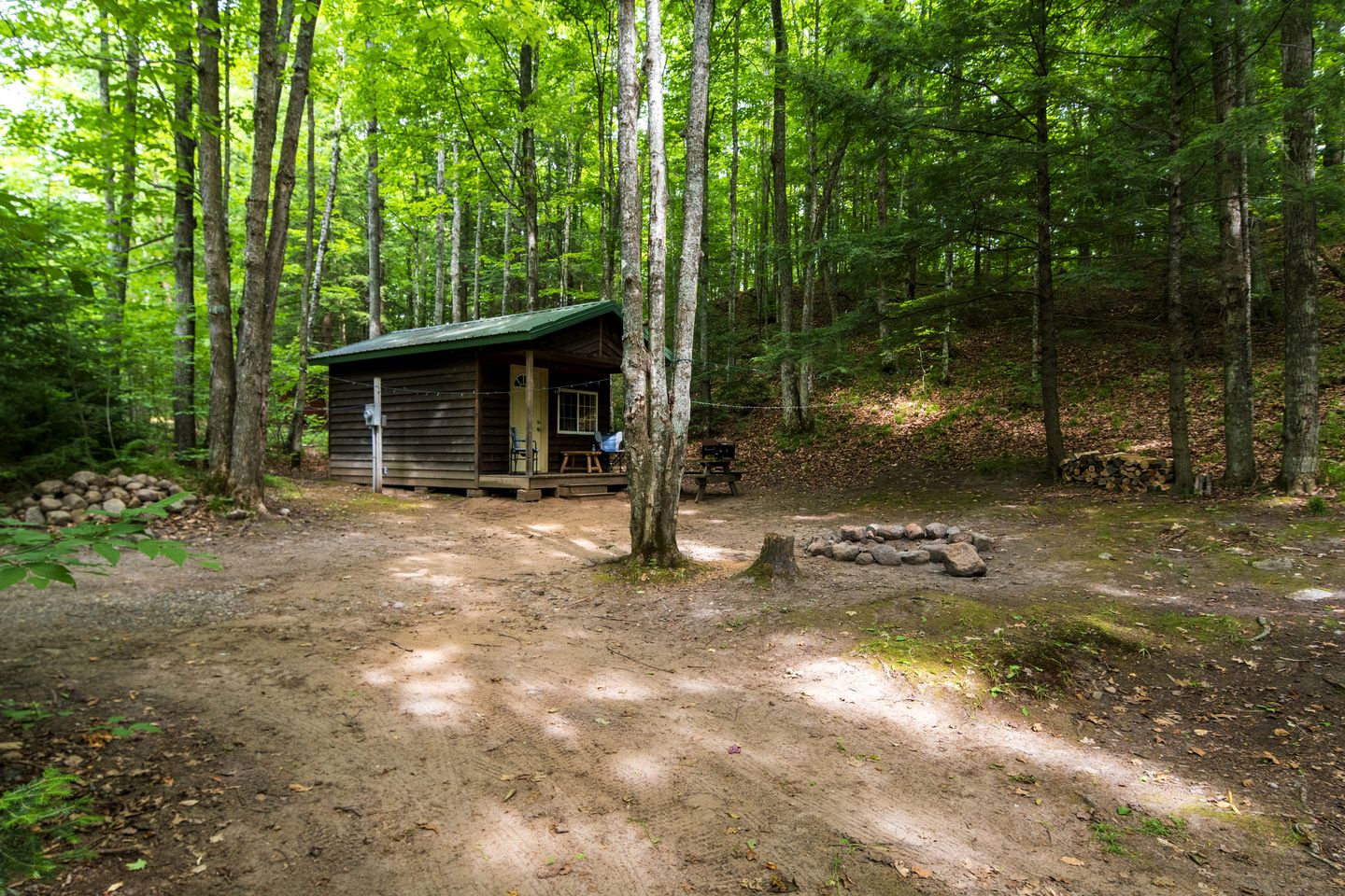Porched Cabin for a Memorable Family Glamping Getaway near Wolf River in Wisconsin