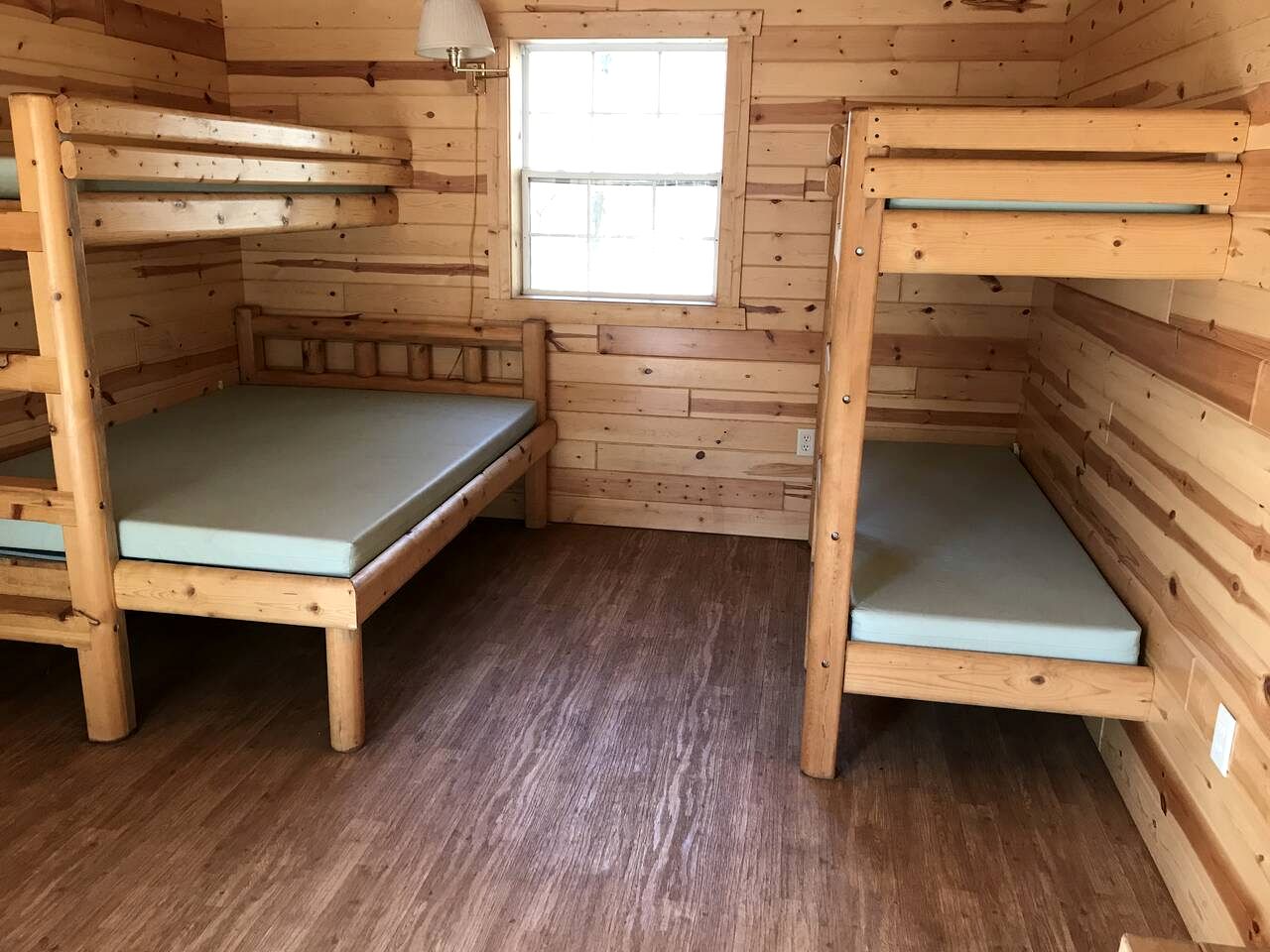 Porched Cabin for a Memorable Family Glamping Getaway near Wolf River in Wisconsin