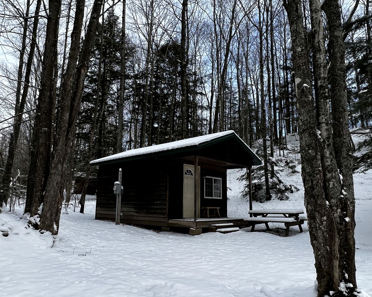 Porched Cabin for a Memorable Family Glamping Getaway near Wolf River in Wisconsin