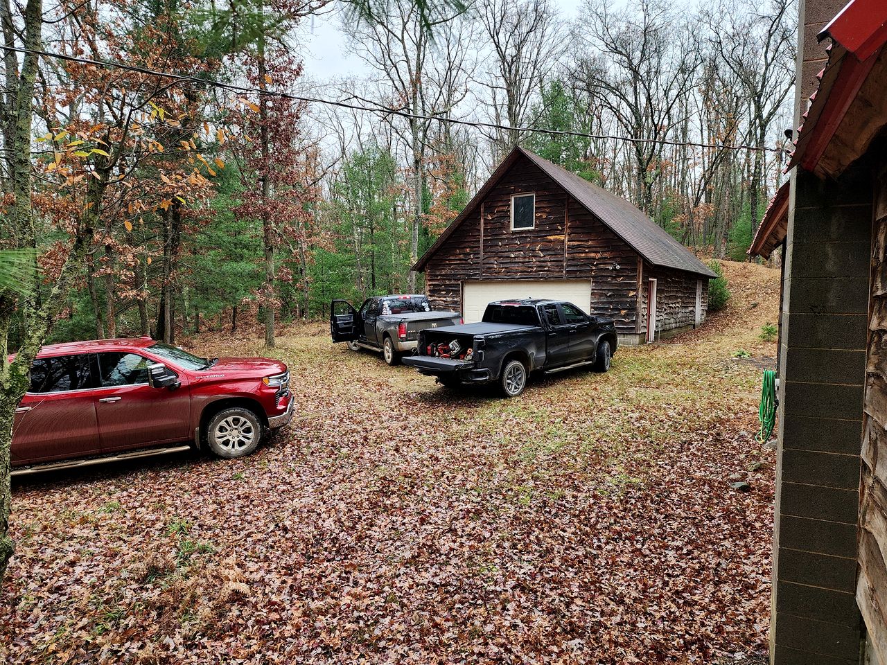 Secluded Luxury Cabin with Hot Tub on 10 Private Acres near Trails in Reed City, Michigan