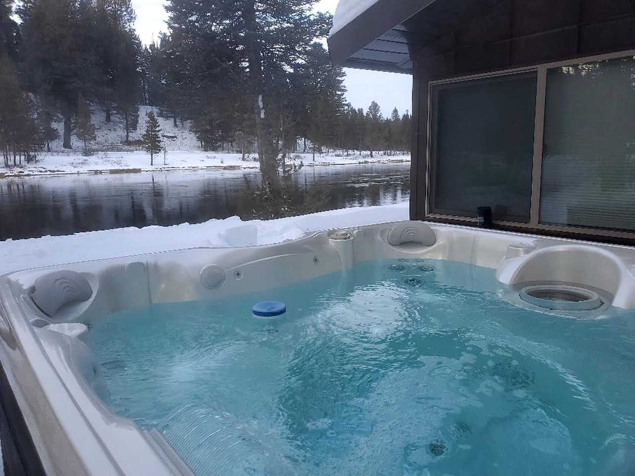 Charming Riverfront Cabin with Hot Tub and Dock Access Near Scenic Trails in Island Park, Idaho