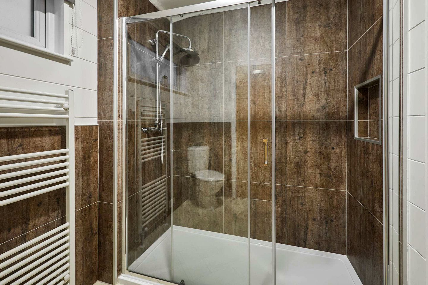 Stylish Spa Lodge with Sauna, Steam Room and Sunken Hot Tub on a Spacious Deck for a Relaxing Countryside Escape near Hexham, England