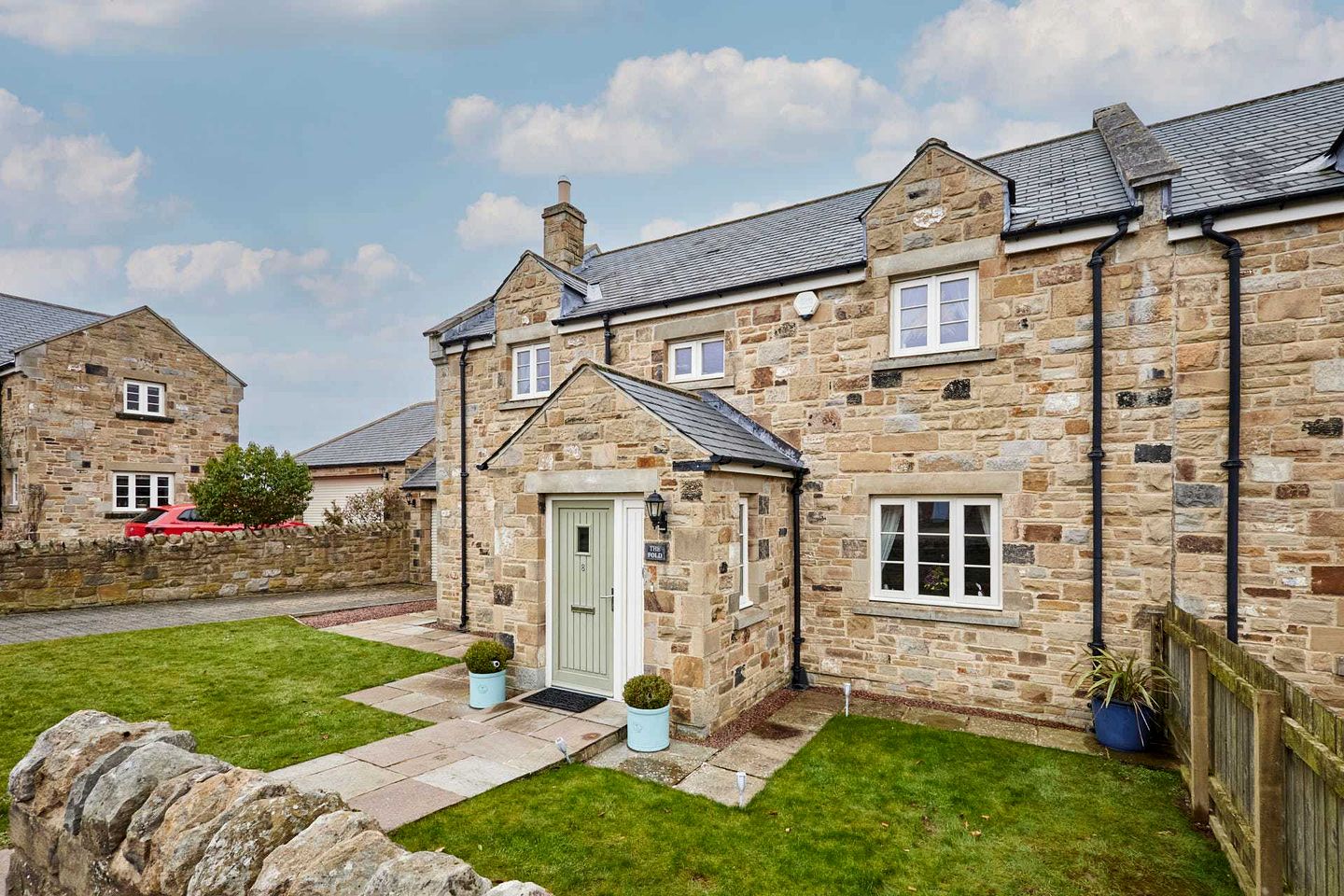 Charming Northumbrian Stone Holiday Home with Garden & Sea Views near Alnwick, Northumberland