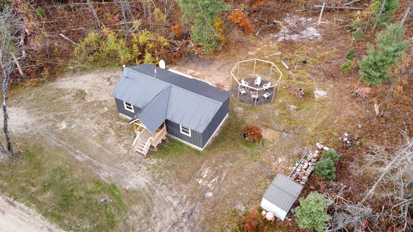 Secluded Rustic Cabin with Hot Tub Near Pere Marquette River in Big Rapids, Michigan