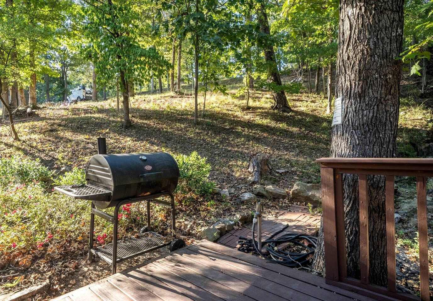 Enchanting Woodland Cabin Escape with Creekside Views near Lake Hamilton Arkansas