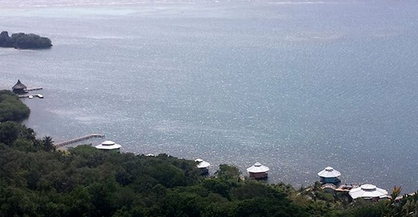 Incredible Cabins Hovering Above Caribbean Sea on Island of Roatan, Honduras