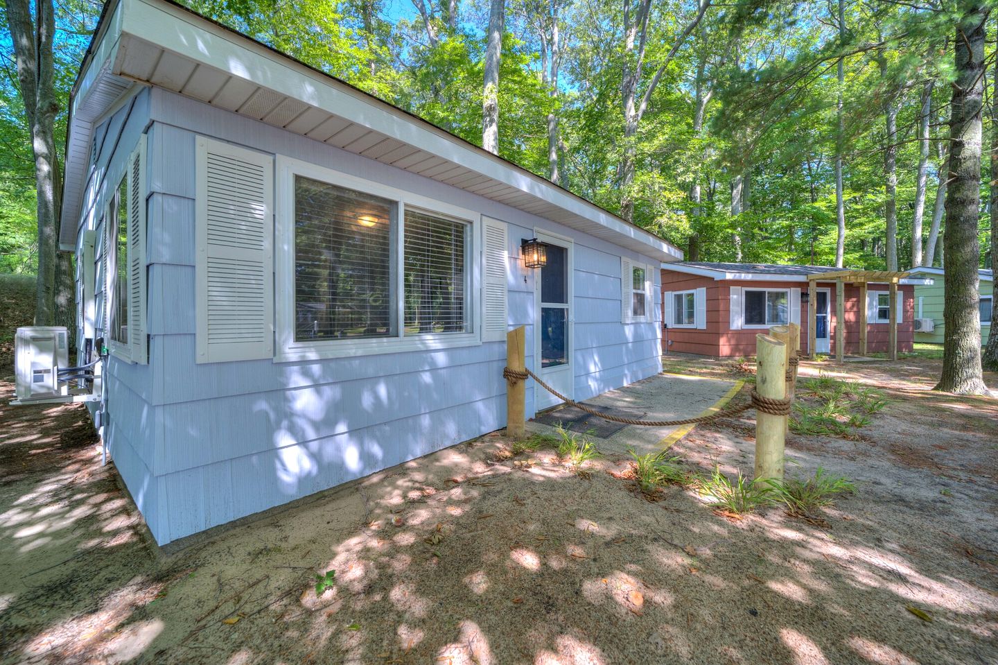 Lake Michigan Retreats in this Charming Cabin Rental with Fire-Pit