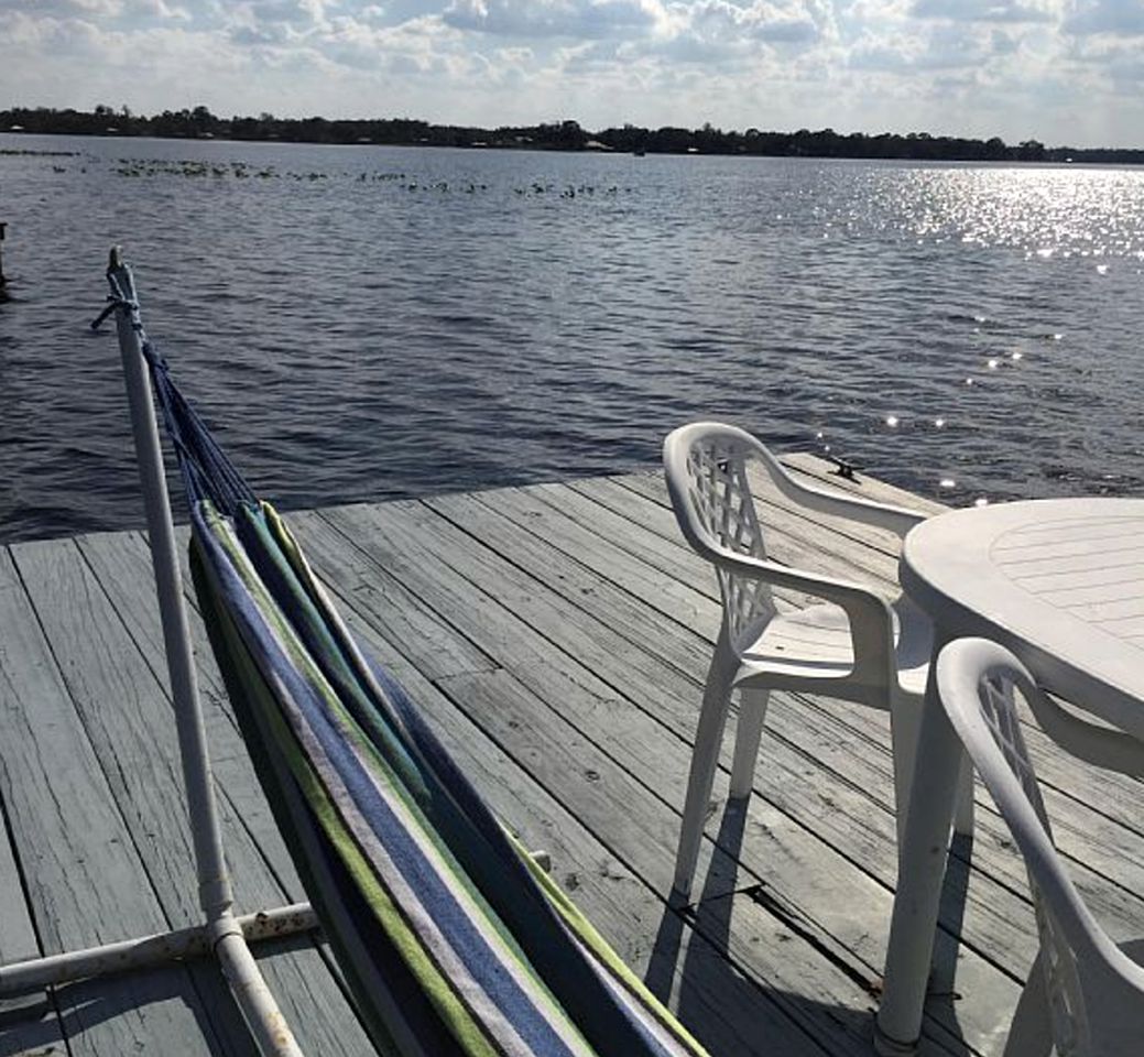 Secluded Cottage Rental with Private Dock on Idyllic Lake Josephine, Florida