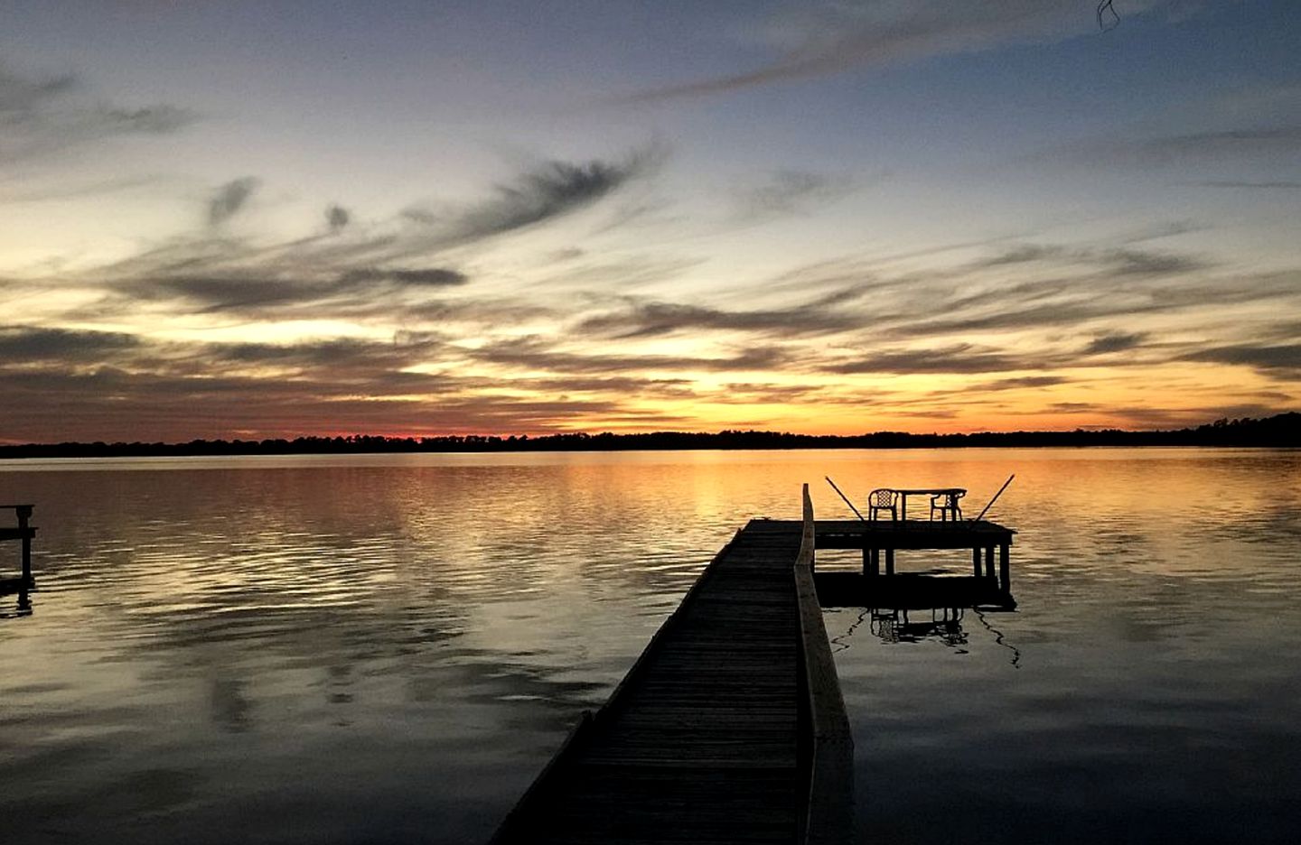 Secluded Cottage Rental with Private Dock on Idyllic Lake Josephine, Florida