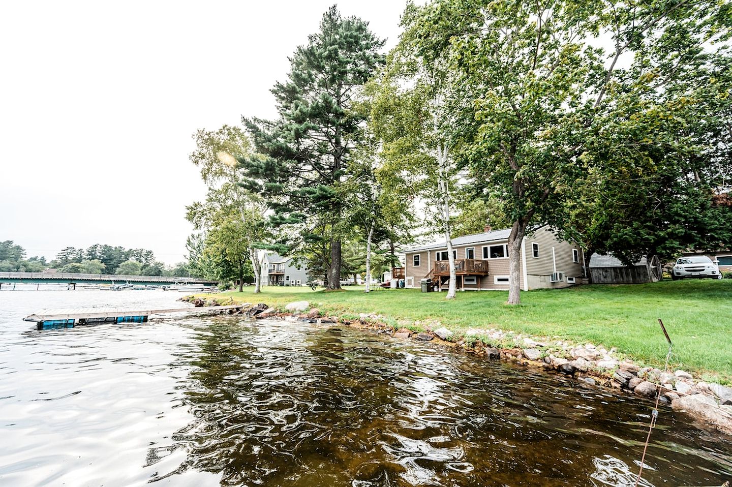 Lakefront Homey Cottage Offering Pristine Views of Cobosseecontee Lake from the Deck in Winthrop, Maine