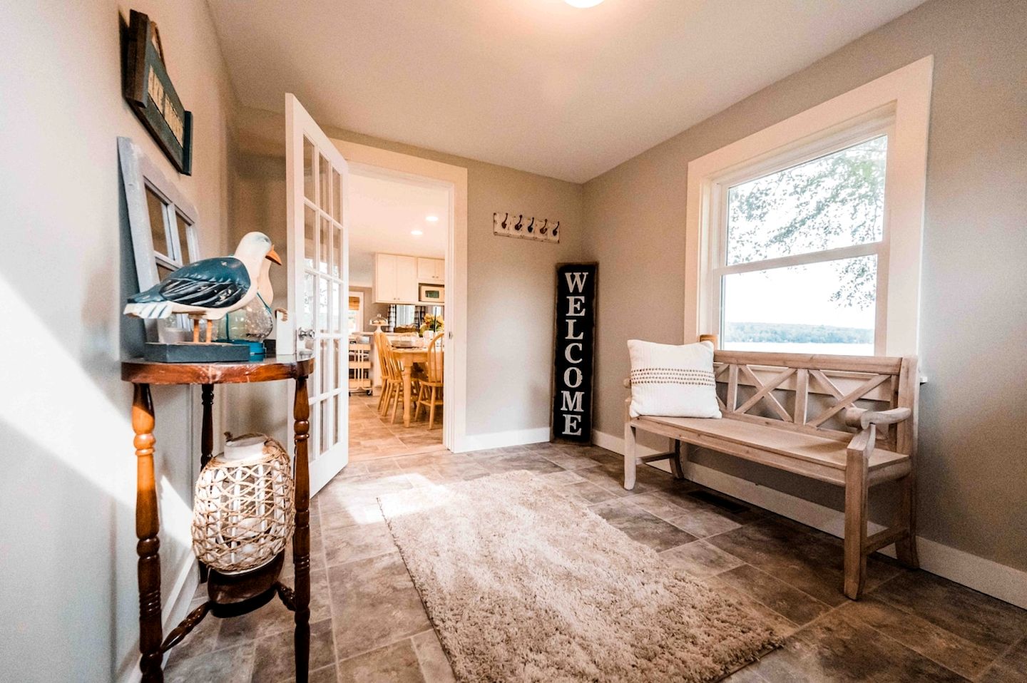 Lakefront Homey Cottage Offering Pristine Views of Cobosseecontee Lake from the Deck in Winthrop, Maine