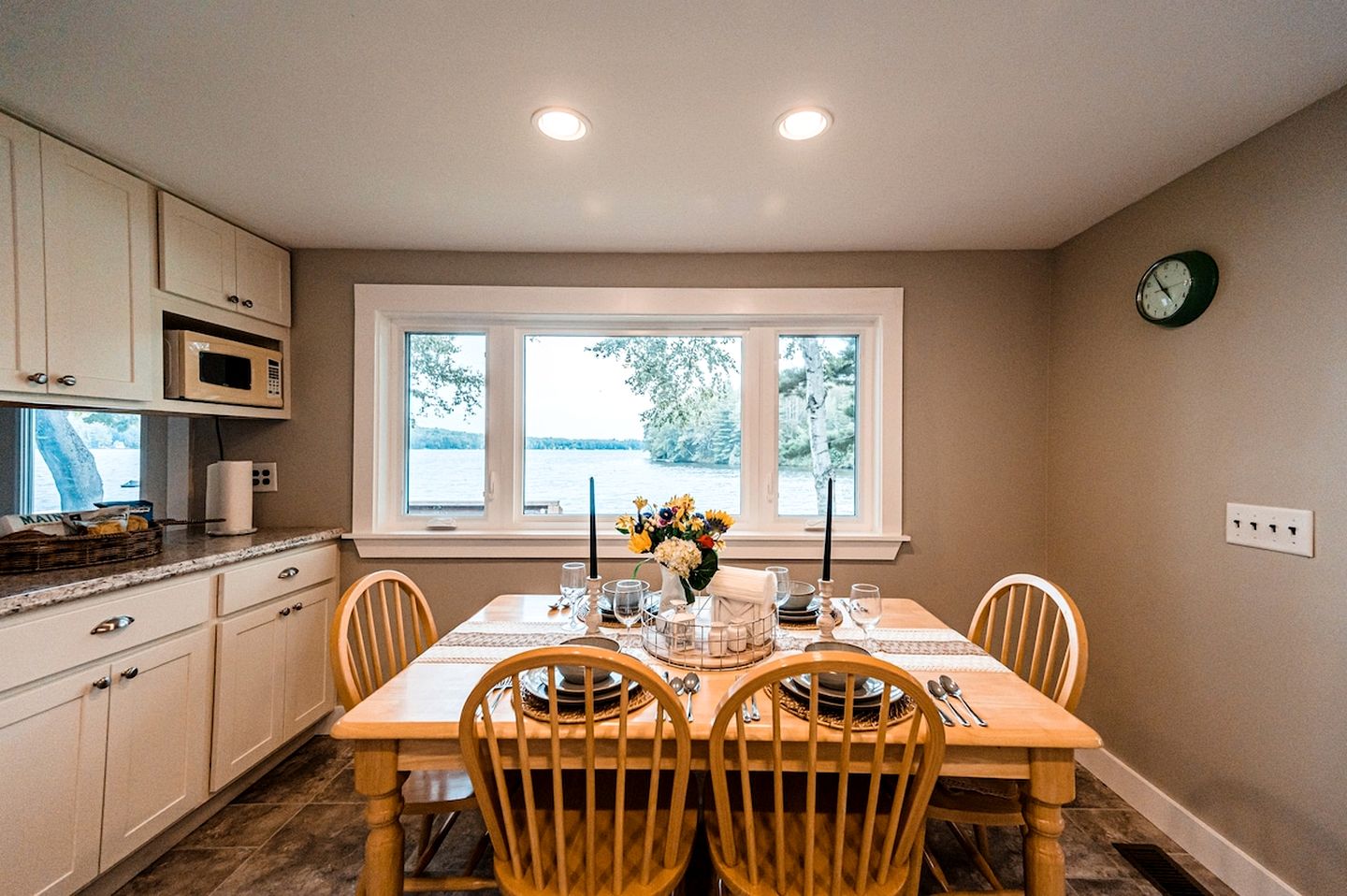 Lakefront Homey Cottage Offering Pristine Views of Cobosseecontee Lake from the Deck in Winthrop, Maine