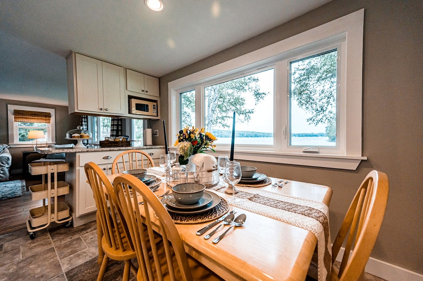 Lakefront Homey Cottage Offering Pristine Views of Cobosseecontee Lake from the Deck in Winthrop, Maine