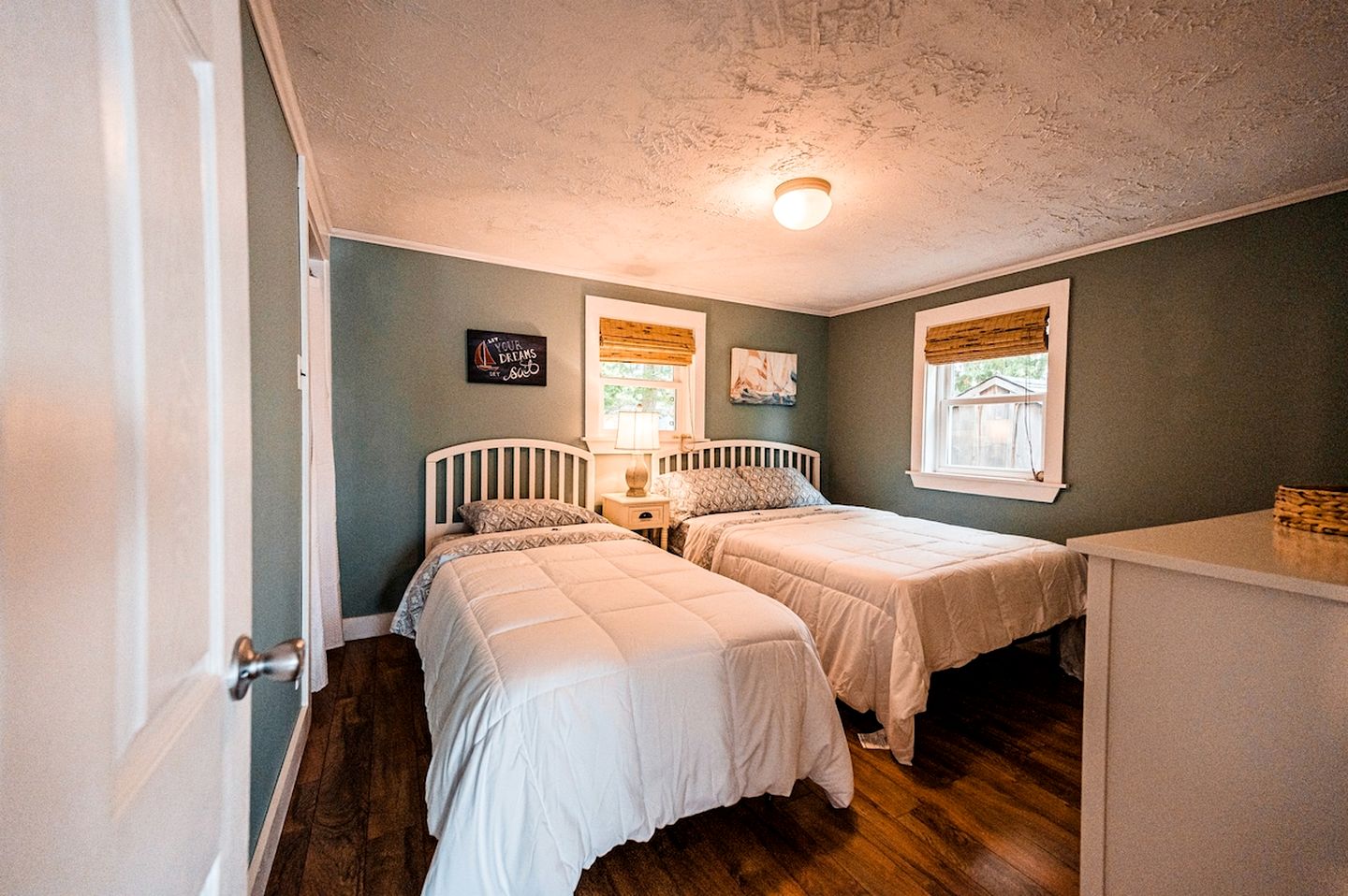 Lakefront Homey Cottage Offering Pristine Views of Cobosseecontee Lake from the Deck in Winthrop, Maine