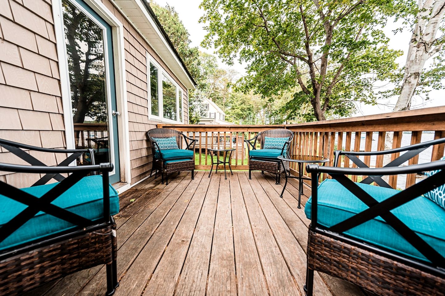 Lakefront Homey Cottage Offering Pristine Views of Cobosseecontee Lake from the Deck in Winthrop, Maine