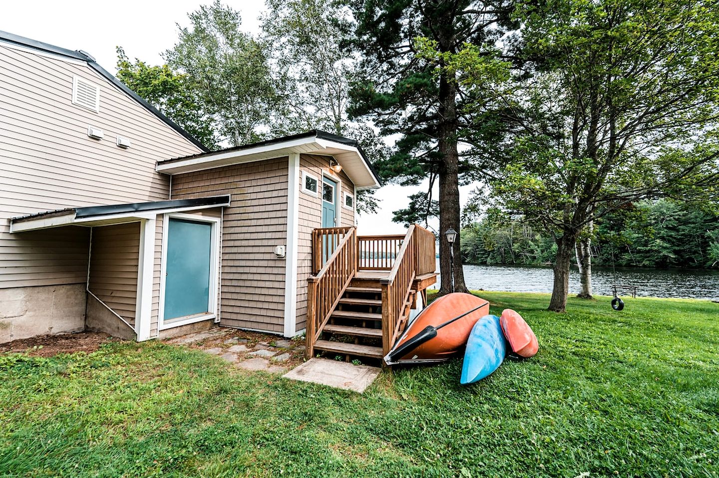 Lakefront Homey Cottage Offering Pristine Views of Cobosseecontee Lake from the Deck in Winthrop, Maine