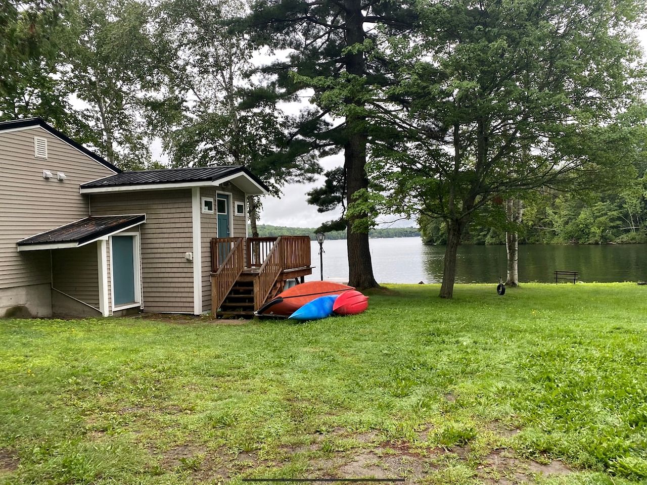 Lakefront Homey Cottage Offering Pristine Views of Cobosseecontee Lake from the Deck in Winthrop, Maine