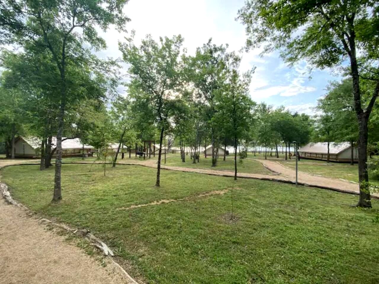 Romantic Lakefront Safari Tent with Fire Pit and Peaceful Views near Bastrop, Texas