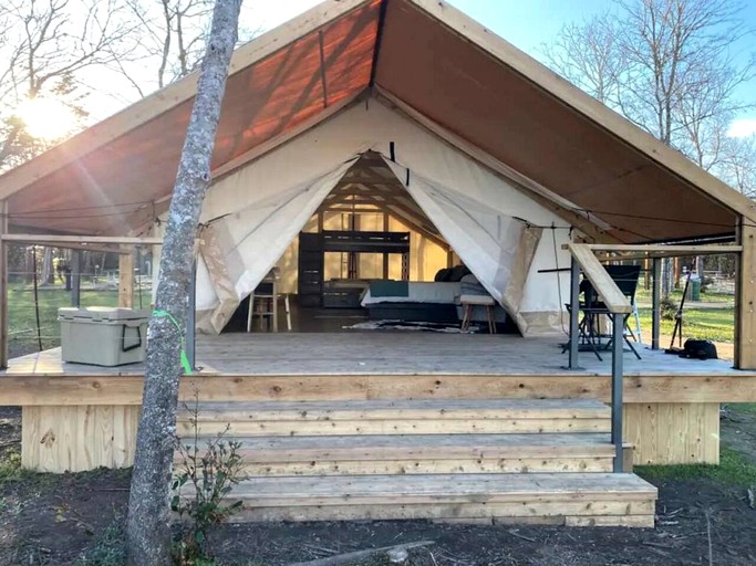 Relaxing Lakeview Safari Tent with Outdoor Seating and Nature Access near Bastrop, Texas