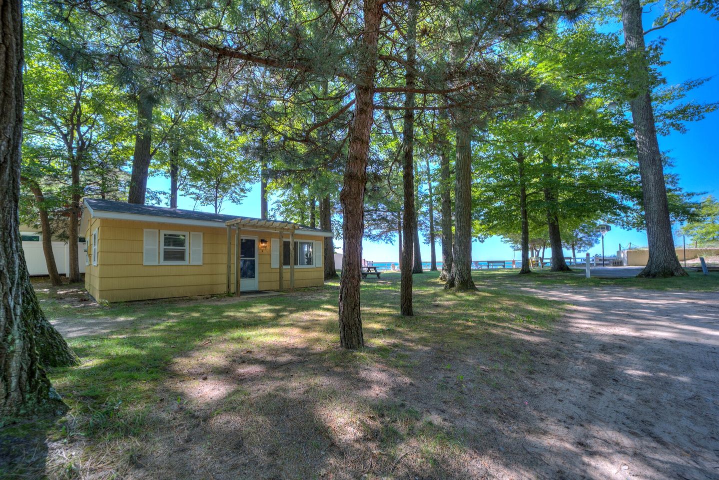 Lakeside Cabin Rental with Beach Access and Fire-Pit for Relaxing Getaways to Lake Michigan