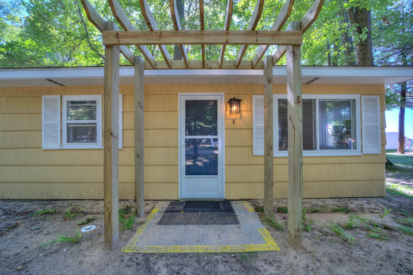 Lakeside Cabin Rental with Beach Access and Fire-Pit for Relaxing Getaways to Lake Michigan