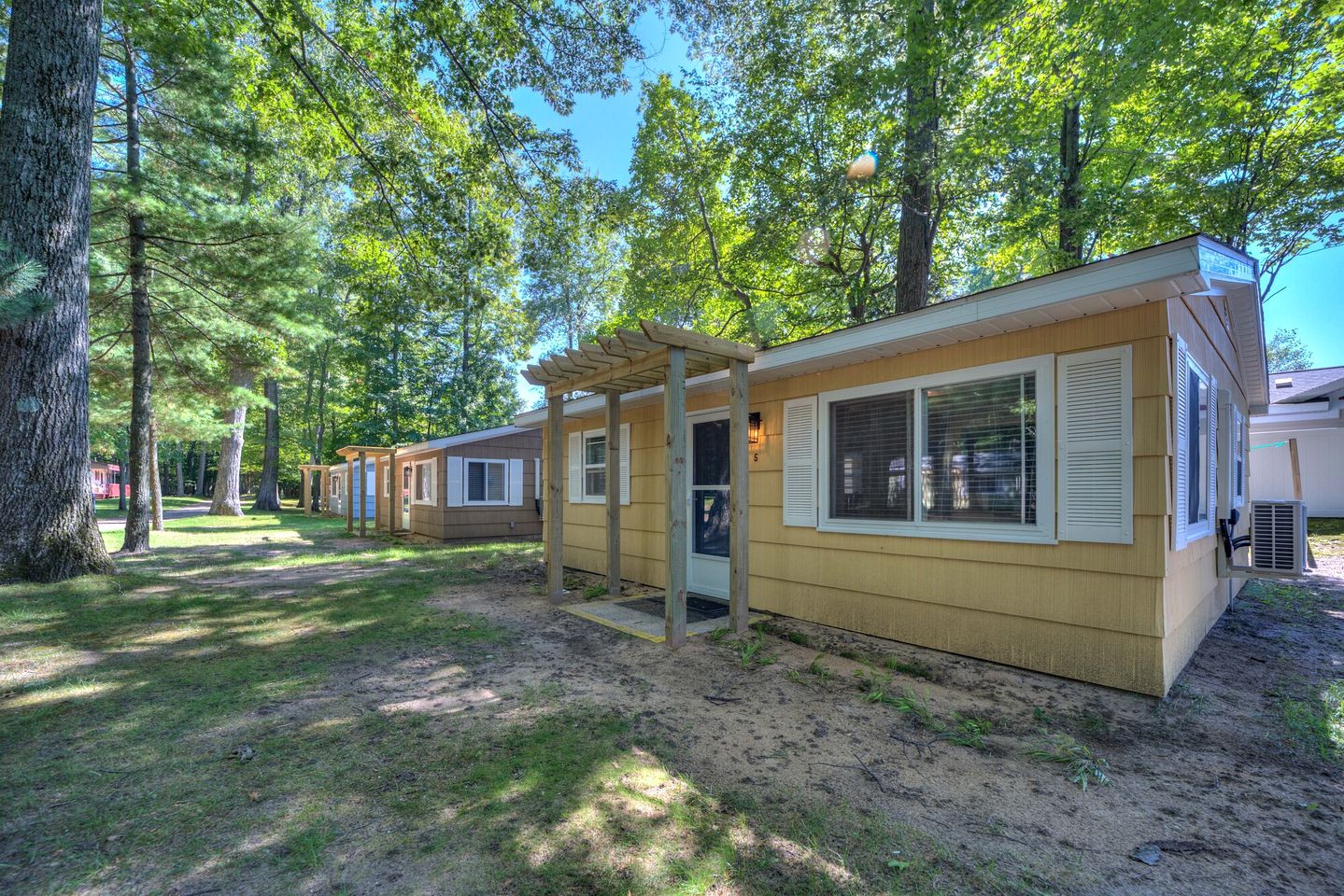 Lakeside Cabin Rental with Beach Access and Fire-Pit for Relaxing Getaways to Lake Michigan