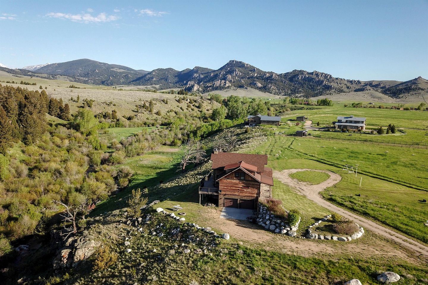 Scenic Mountain Cabin with Creekside Deck & Outdoor Fireplace near North Meadow Creek, Montana