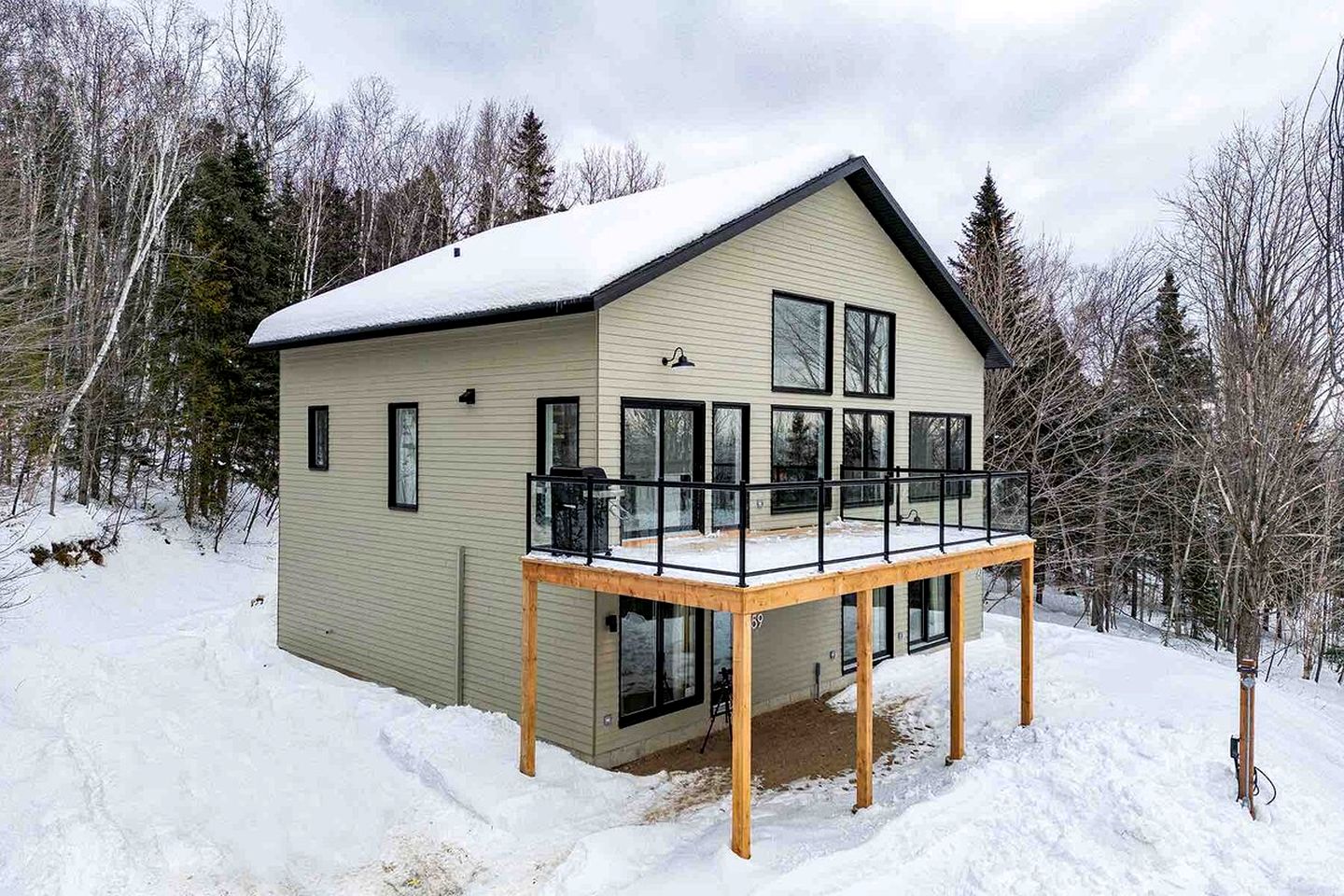 Contemporary Pet-Friendly Mountain Getaway with Saint Lawrence River Views near Baie-Saint-Paul, Quebec