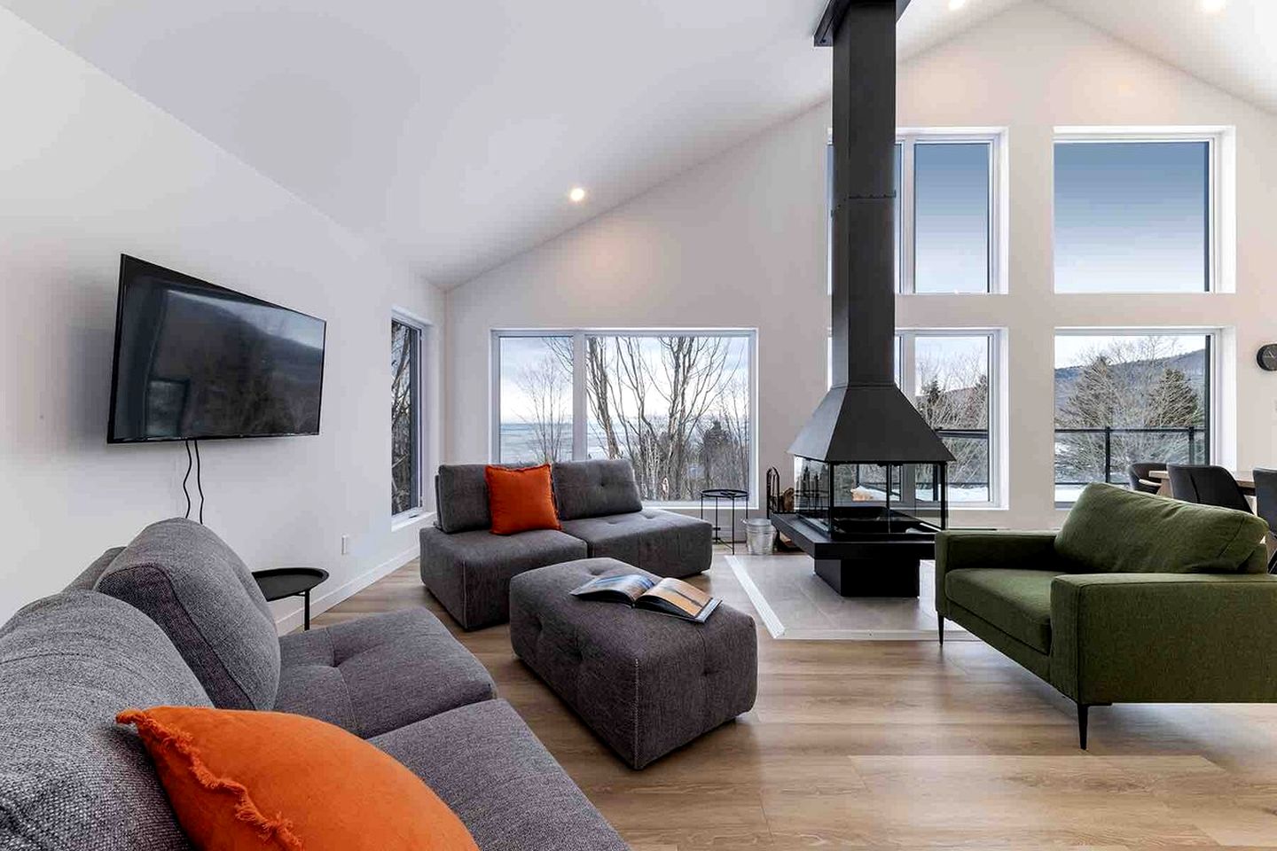 Contemporary Pet-Friendly Mountain Getaway with Saint Lawrence River Views near Baie-Saint-Paul, Quebec