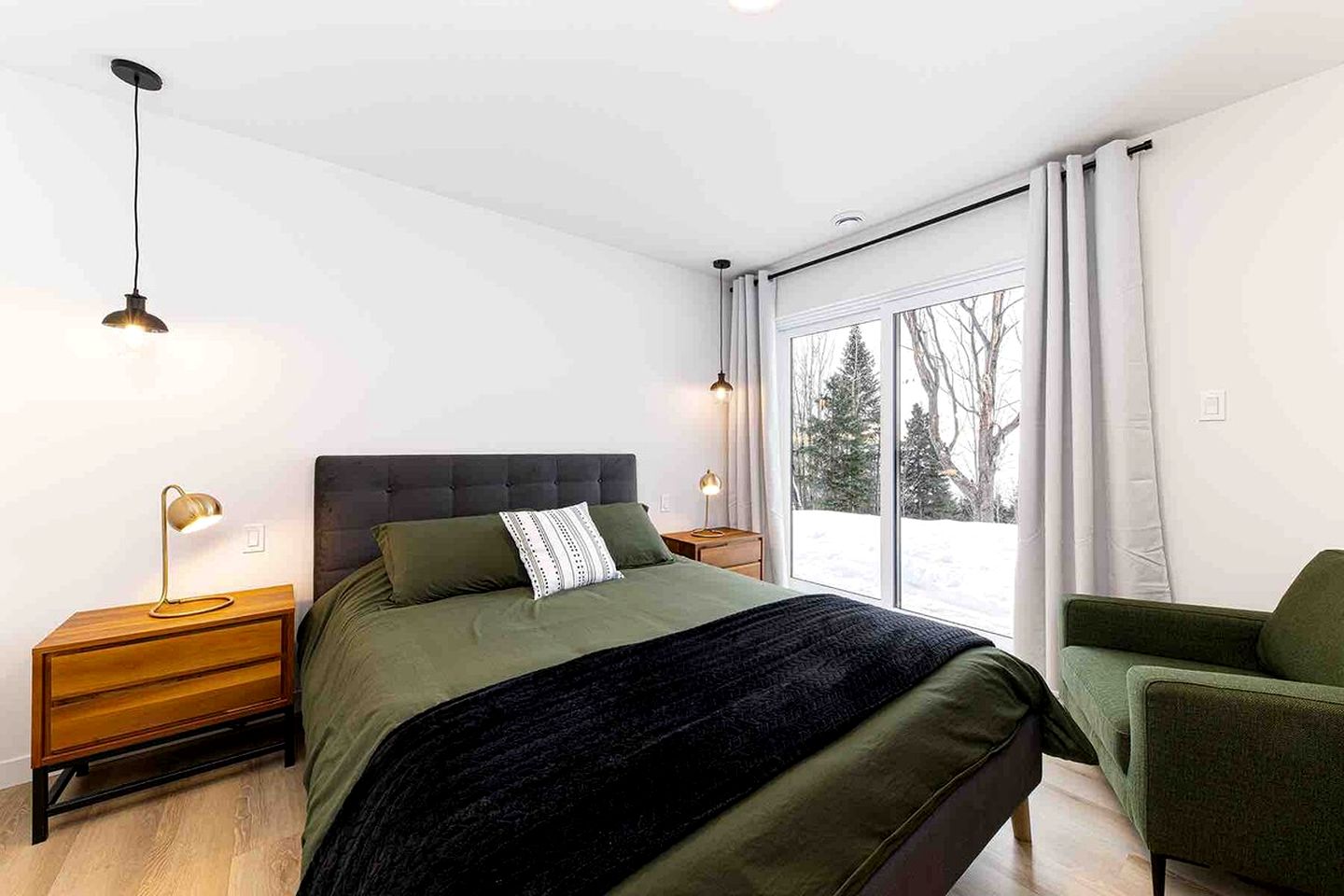 Contemporary Pet-Friendly Mountain Getaway with Saint Lawrence River Views near Baie-Saint-Paul, Quebec