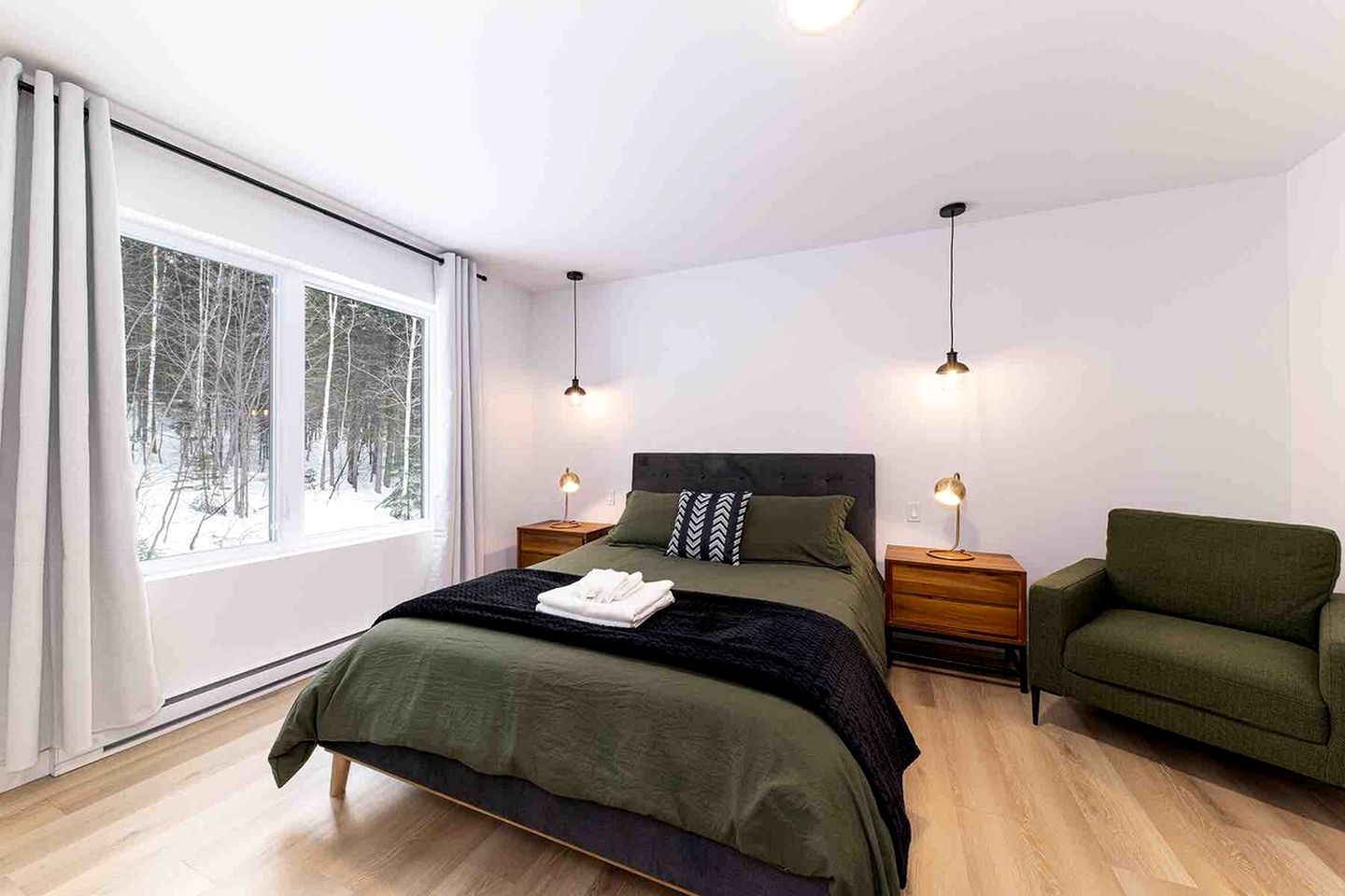 Contemporary Pet-Friendly Mountain Getaway with Saint Lawrence River Views near Baie-Saint-Paul, Quebec