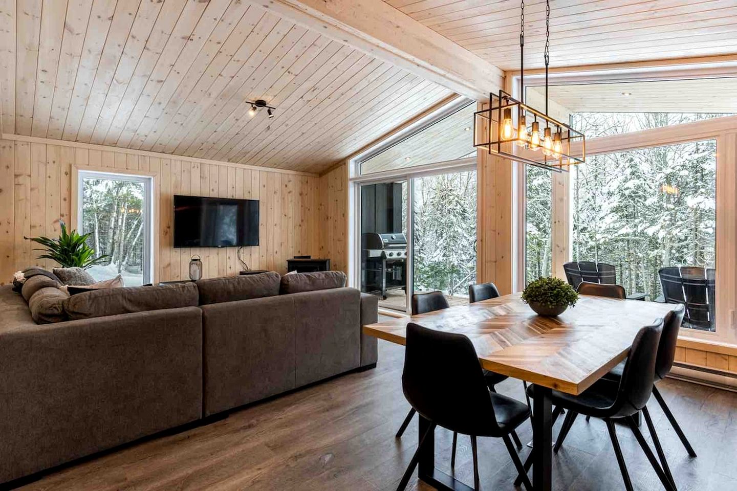 Secluded Forest Retreat with Stylish Interior in Domaine Charlevoix, Quebec