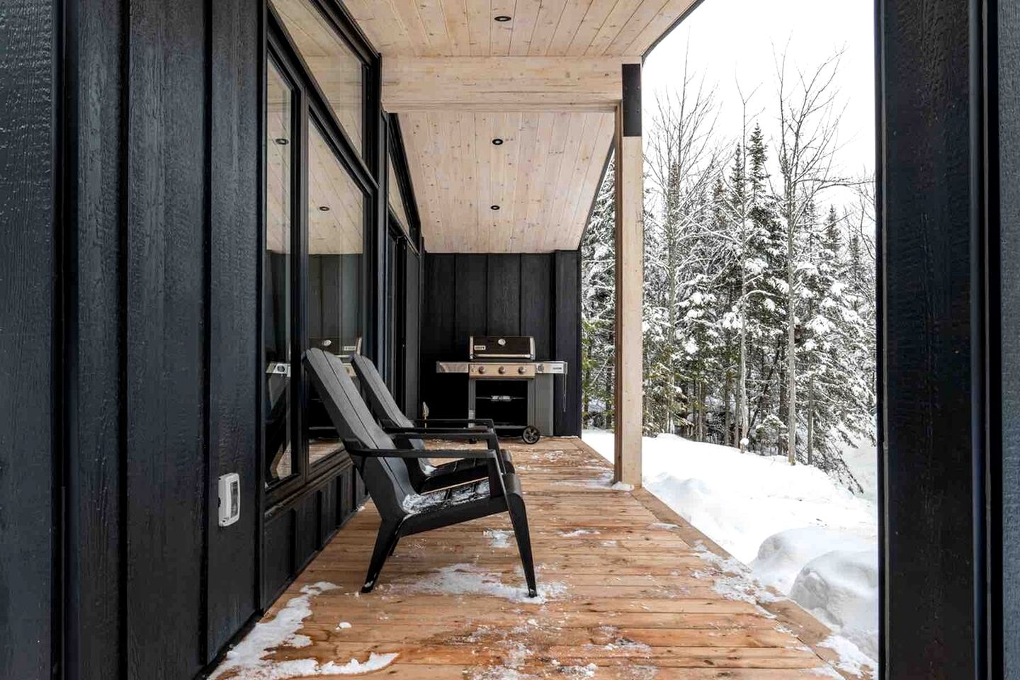 Secluded Forest Retreat with Stylish Interior in Domaine Charlevoix, Quebec