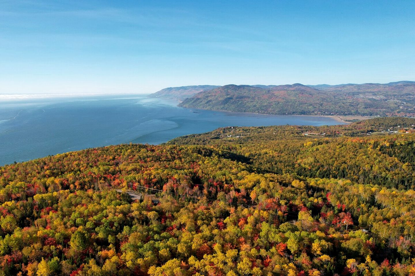 Secluded Forest Retreat with Stylish Interior in Domaine Charlevoix, Quebec