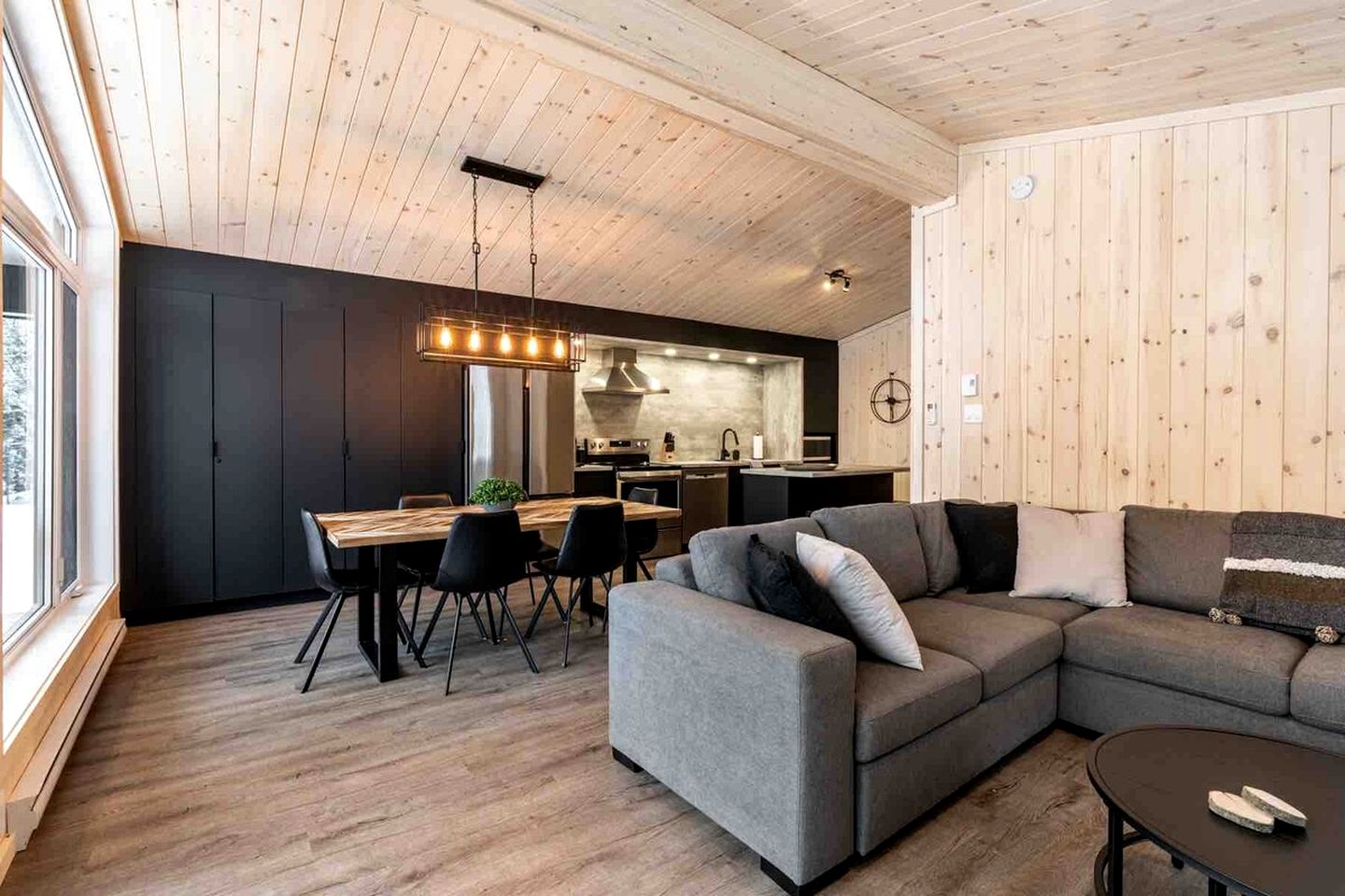 Secluded Forest Retreat with Stylish Interior in Domaine Charlevoix, Quebec